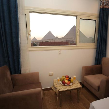 Hussien Lotus Pyramids View Cairo Exterior foto