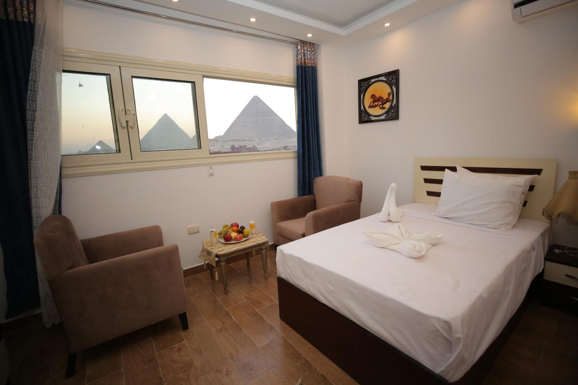 Hussien Lotus Pyramids View Cairo Exterior foto