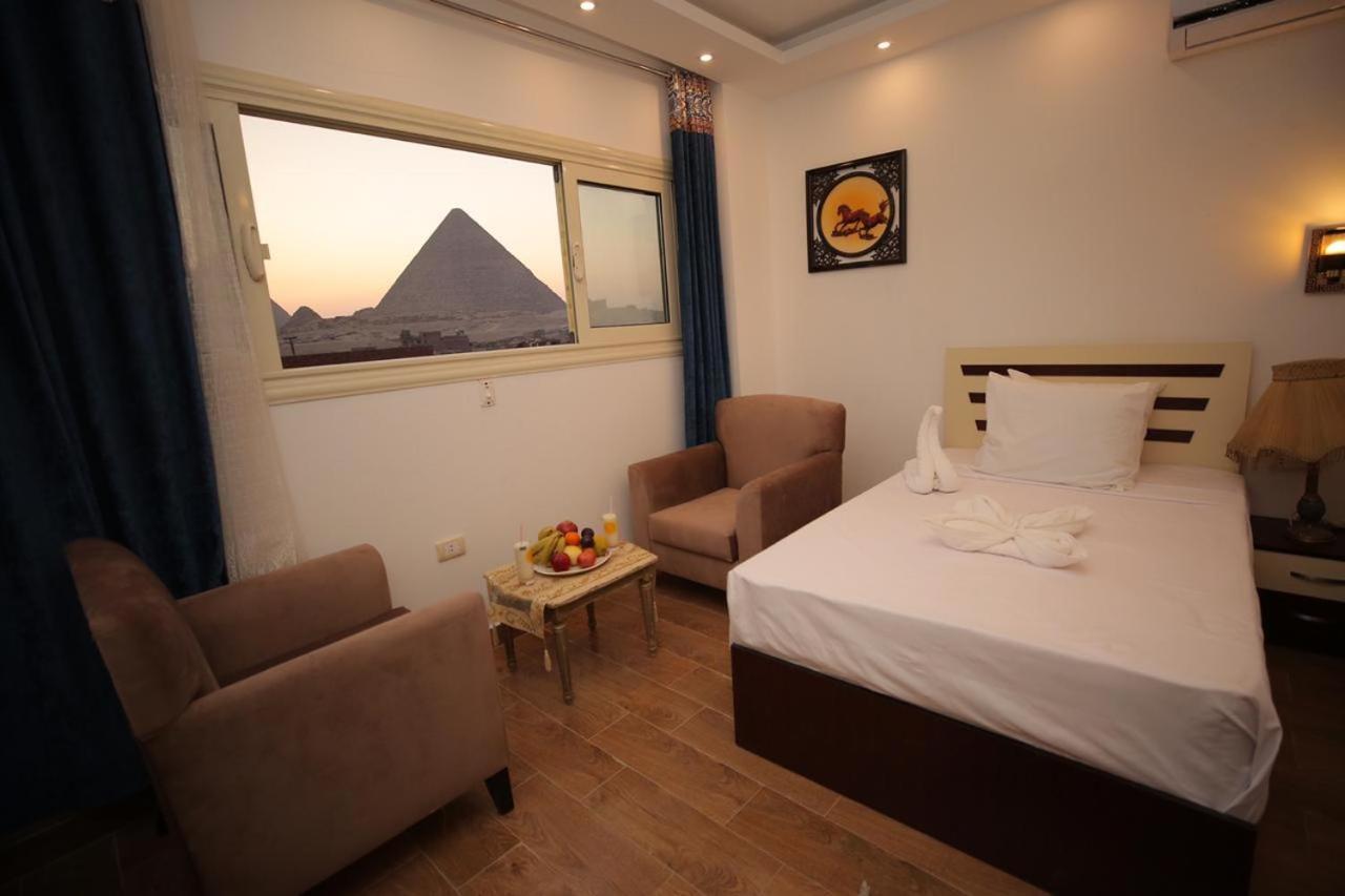 Hussien Lotus Pyramids View Cairo Exterior foto